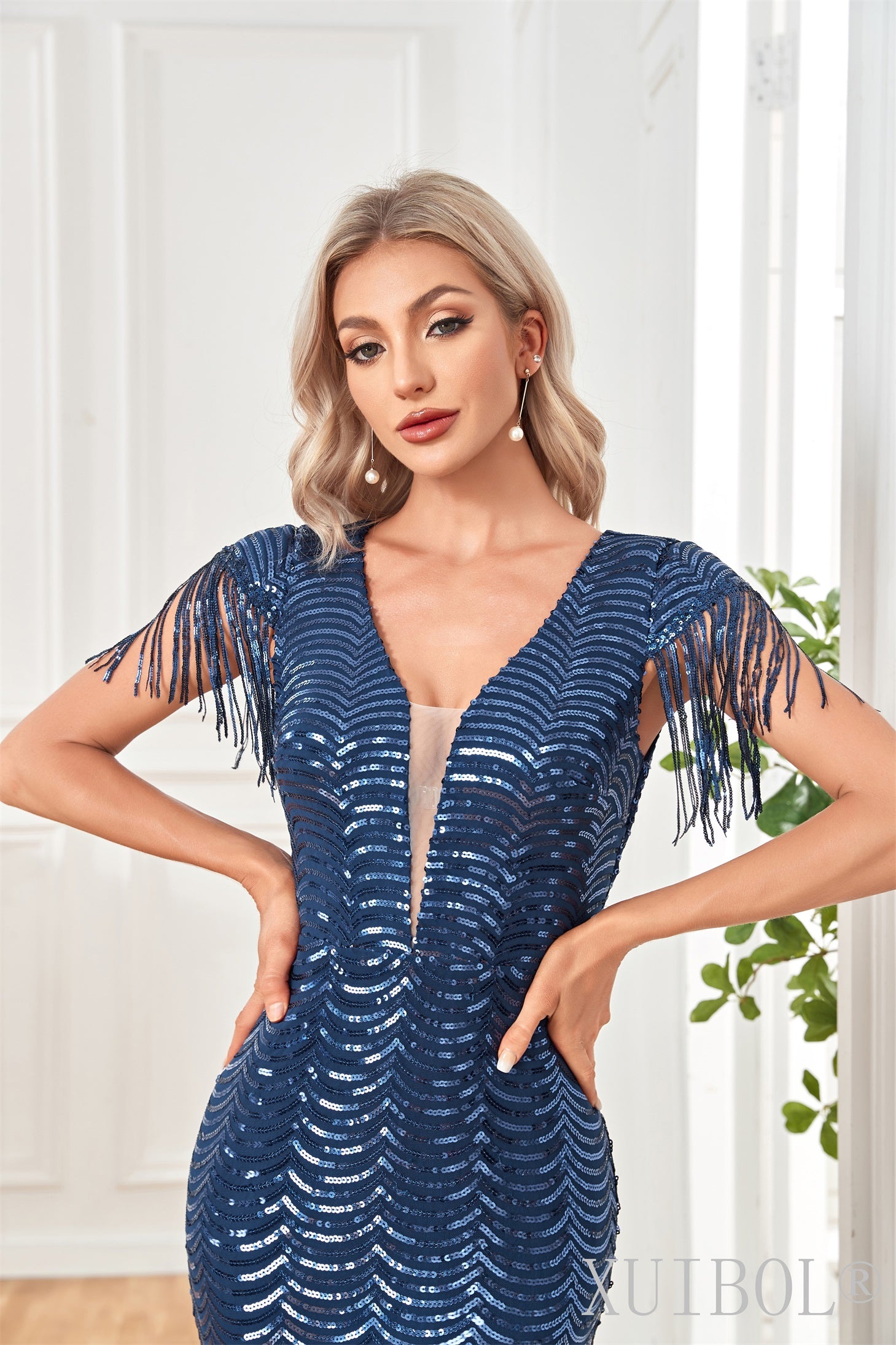XUIBOL | plunging sequin stream whiskers and beaded a-line gown