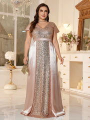 Plus-Size Floor-Fength Wedding Guest Gown With a V-Neck and Shoulder-Covering Sleeves.
