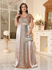 Plus-Size Floor-Fength Wedding Guest Gown With a V-Neck and Shoulder-Covering Sleeves.