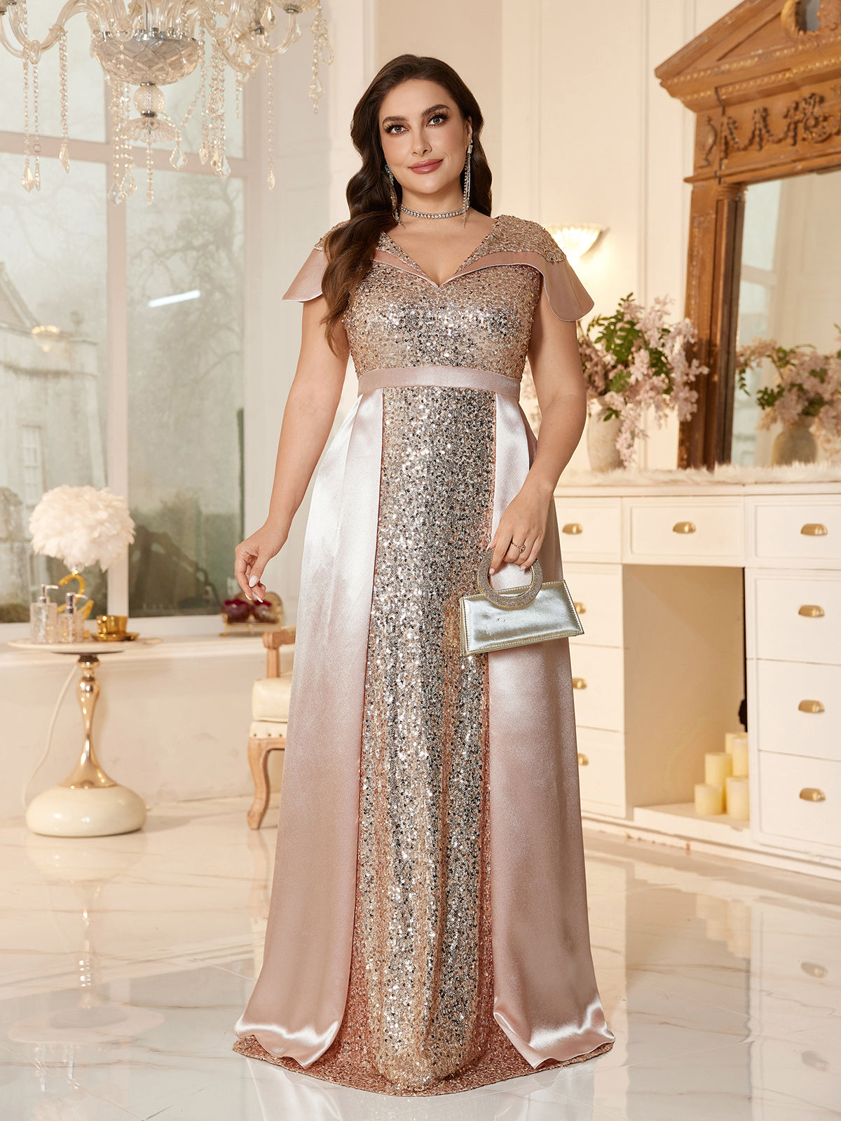 Plus-Size Floor-Fength Wedding Guest Gown With a V-Neck and Shoulder-Covering Sleeves.