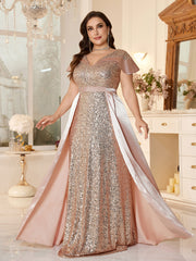 Plus-Size Floor-Fength Wedding Guest Gown With a V-Neck and Shoulder-Covering Sleeves.