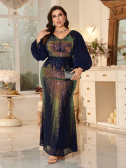 Plus-Size Navy Blue Long-Sleeved Evening Gown With iriDescent Sequins and Lantern Sleeves.