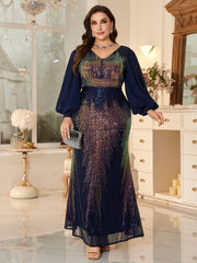 Plus-Size Navy Blue Long-Sleeved Evening Gown With iriDescent Sequins and Lantern Sleeves.