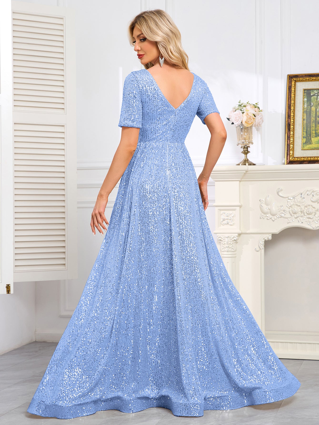 Royal Blue Sequined Short-Sleeve Gown With a Deep V-Neck and a Full, Flared Skirt.