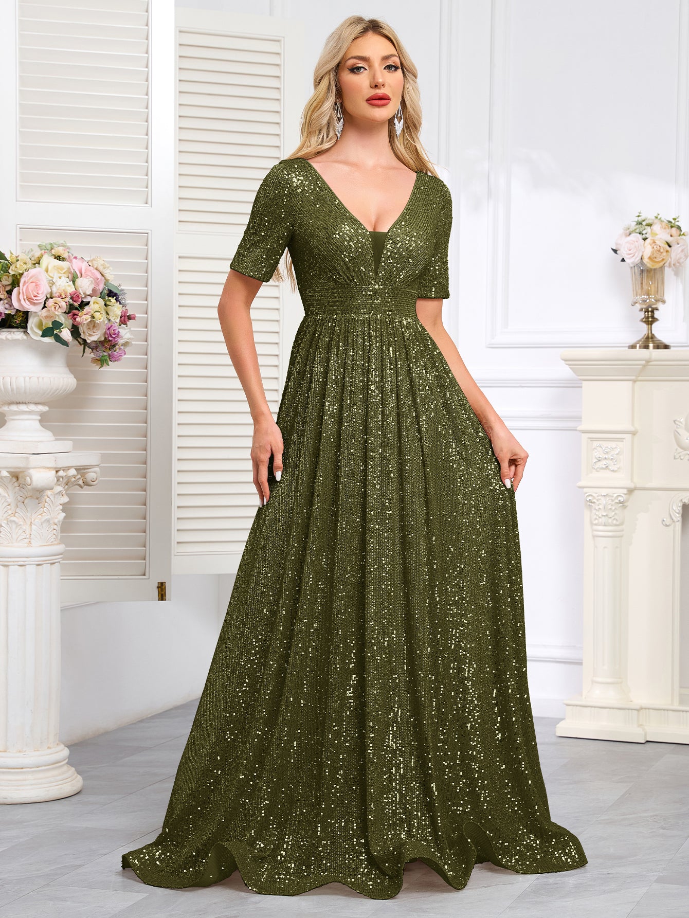 Royal Blue Sequined Short-Sleeve Gown With a Deep V-Neck and a Full, Flared Skirt.