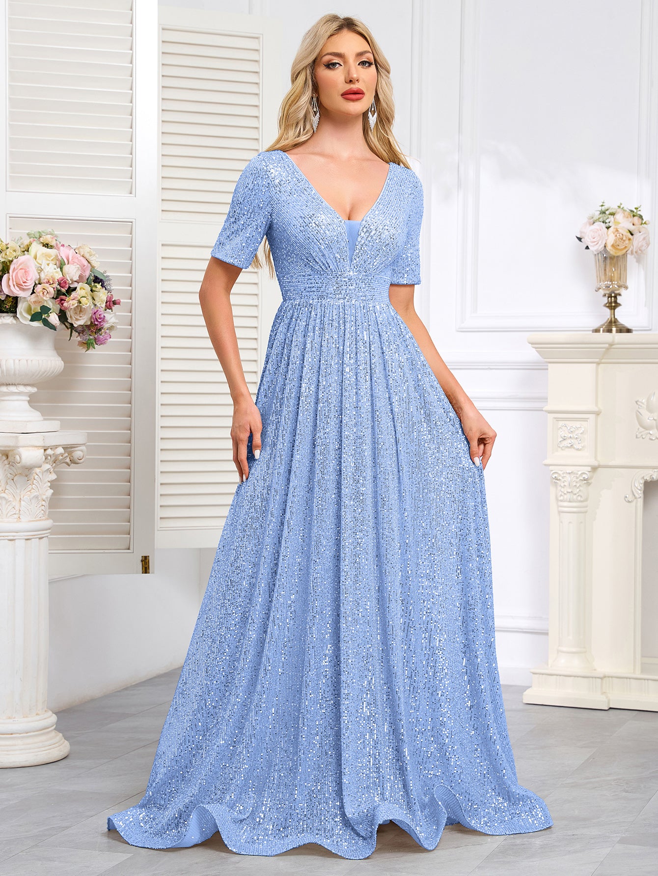 Royal Blue Sequined Short-Sleeve Gown With a Deep V-Neck and a Full, Flared Skirt.