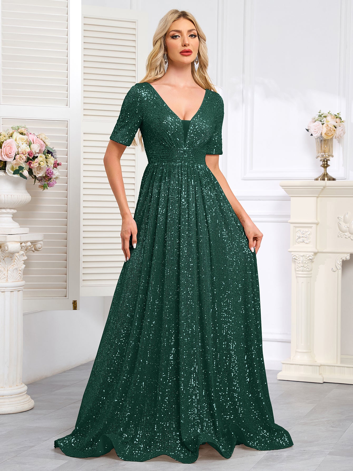 Royal Blue Sequined Short-Sleeve Gown With a Deep V-Neck and a Full, Flared Skirt.
