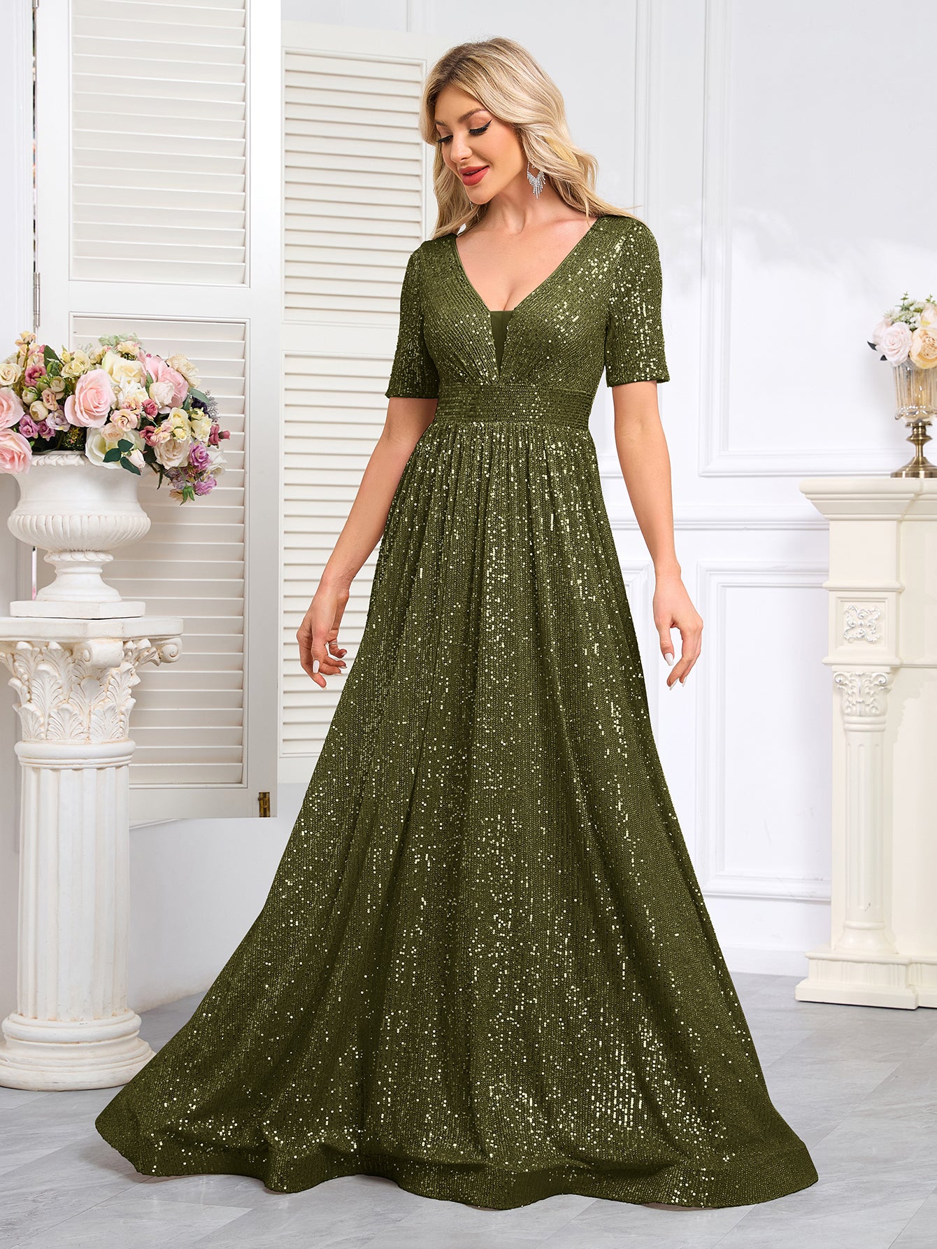 Royal Blue Sequined Short-Sleeve Gown With a Deep V-Neck and a Full, Flared Skirt.