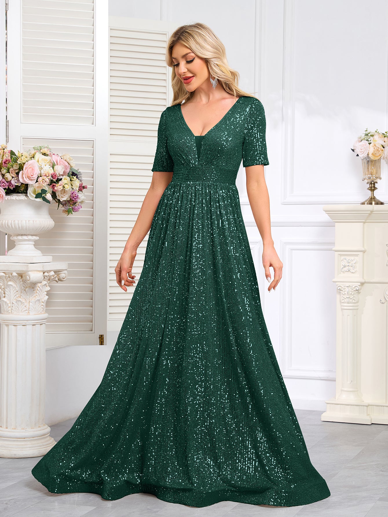 Royal Blue Sequined Short-Sleeve Gown With a Deep V-Neck and a Full, Flared Skirt.