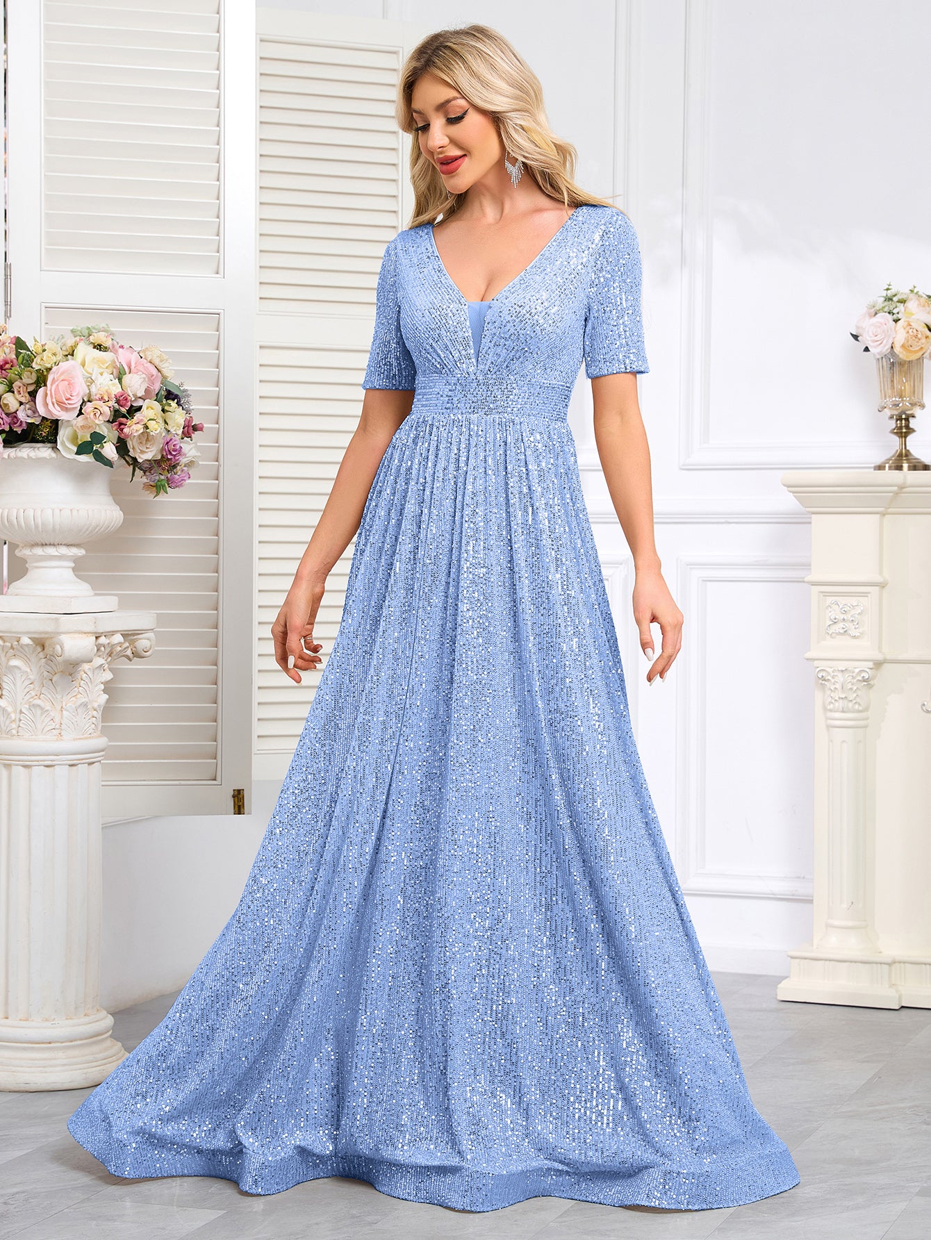 Royal Blue Sequined Short-Sleeve Gown With a Deep V-Neck and a Full, Flared Skirt.