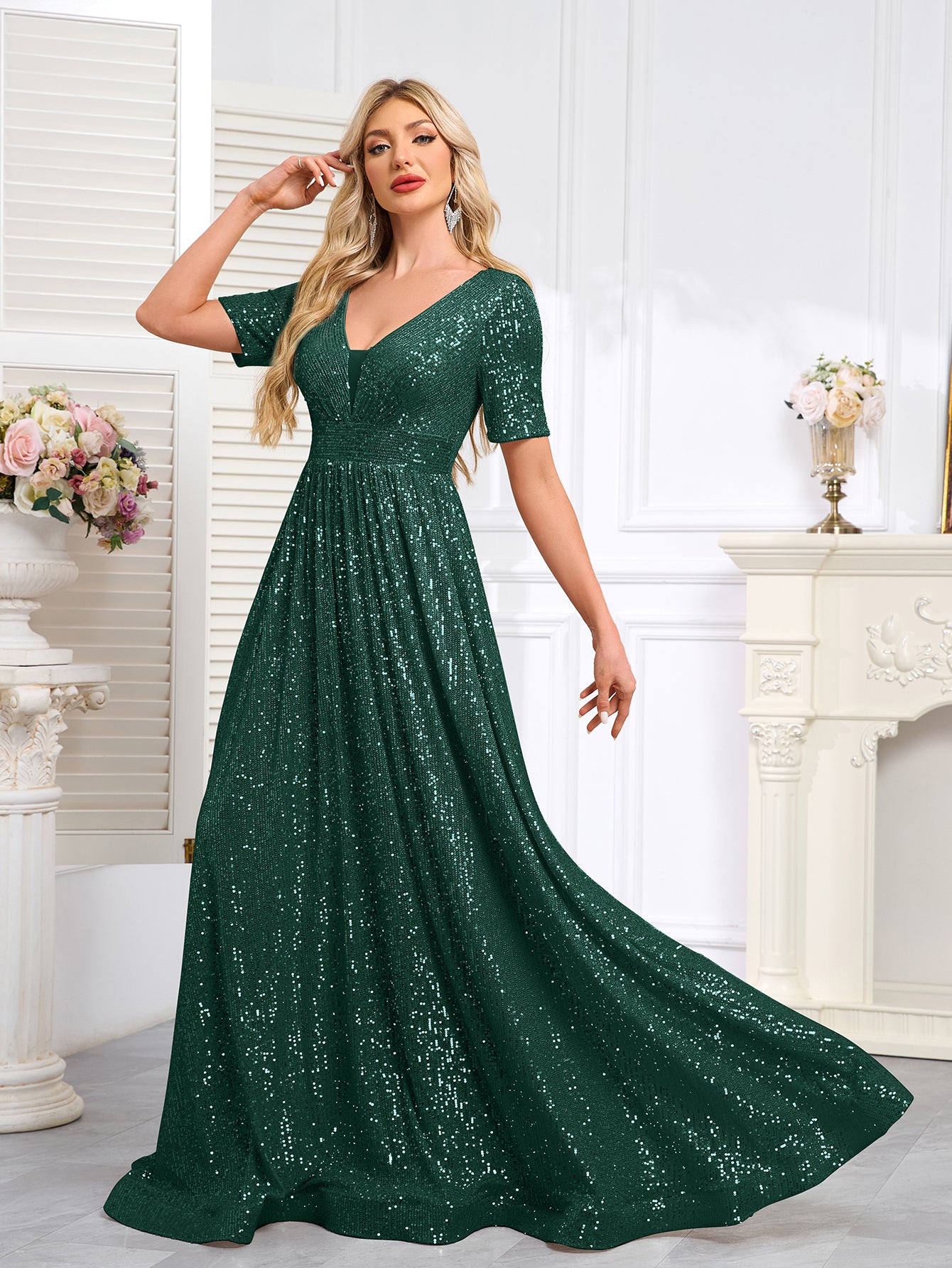 Royal Blue Sequined Short-Sleeve Gown With a Deep V-Neck and a Full, Flared Skirt.