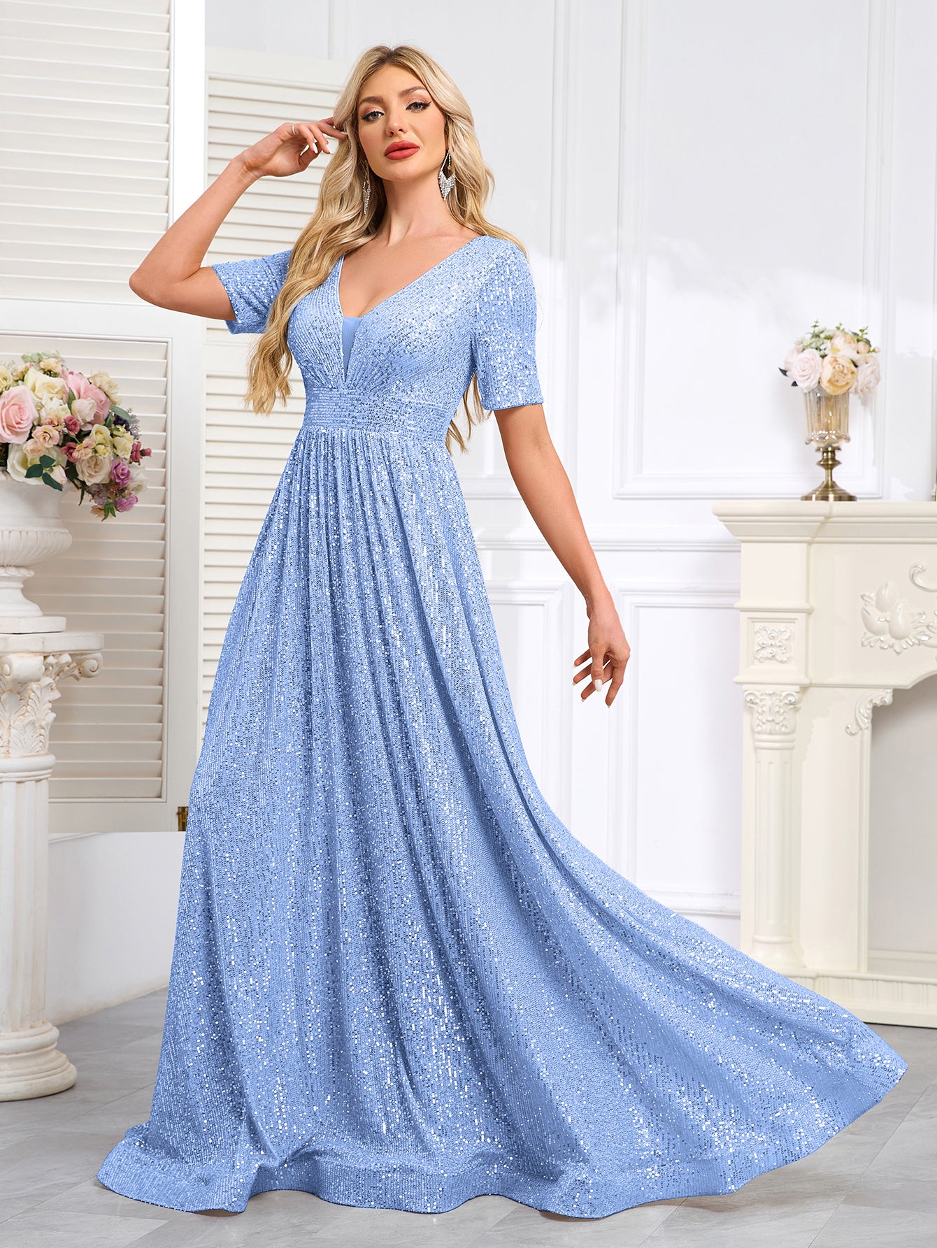 Royal Blue Sequined Short-Sleeve Gown With a Deep V-Neck and a Full, Flared Skirt.
