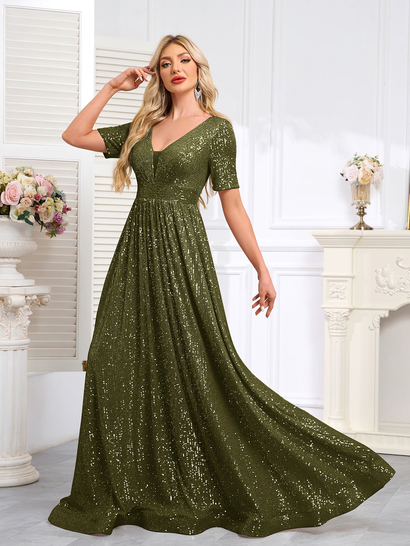 Royal Blue Sequined Short-Sleeve Gown With a Deep V-Neck and a Full, Flared Skirt.