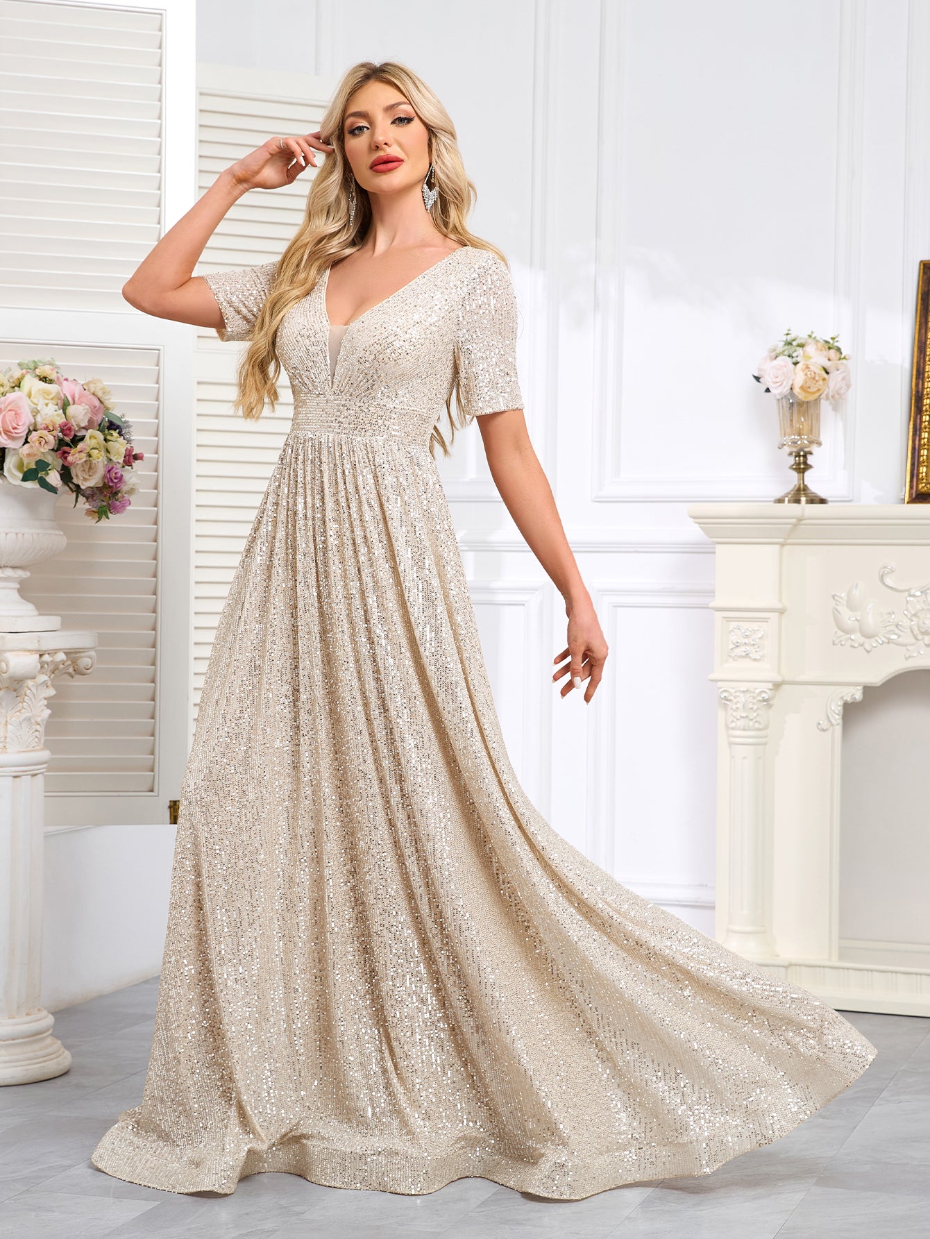 Royal Blue Sequined Short-Sleeve Gown With a Deep V-Neck and a Full, Flared Skirt.