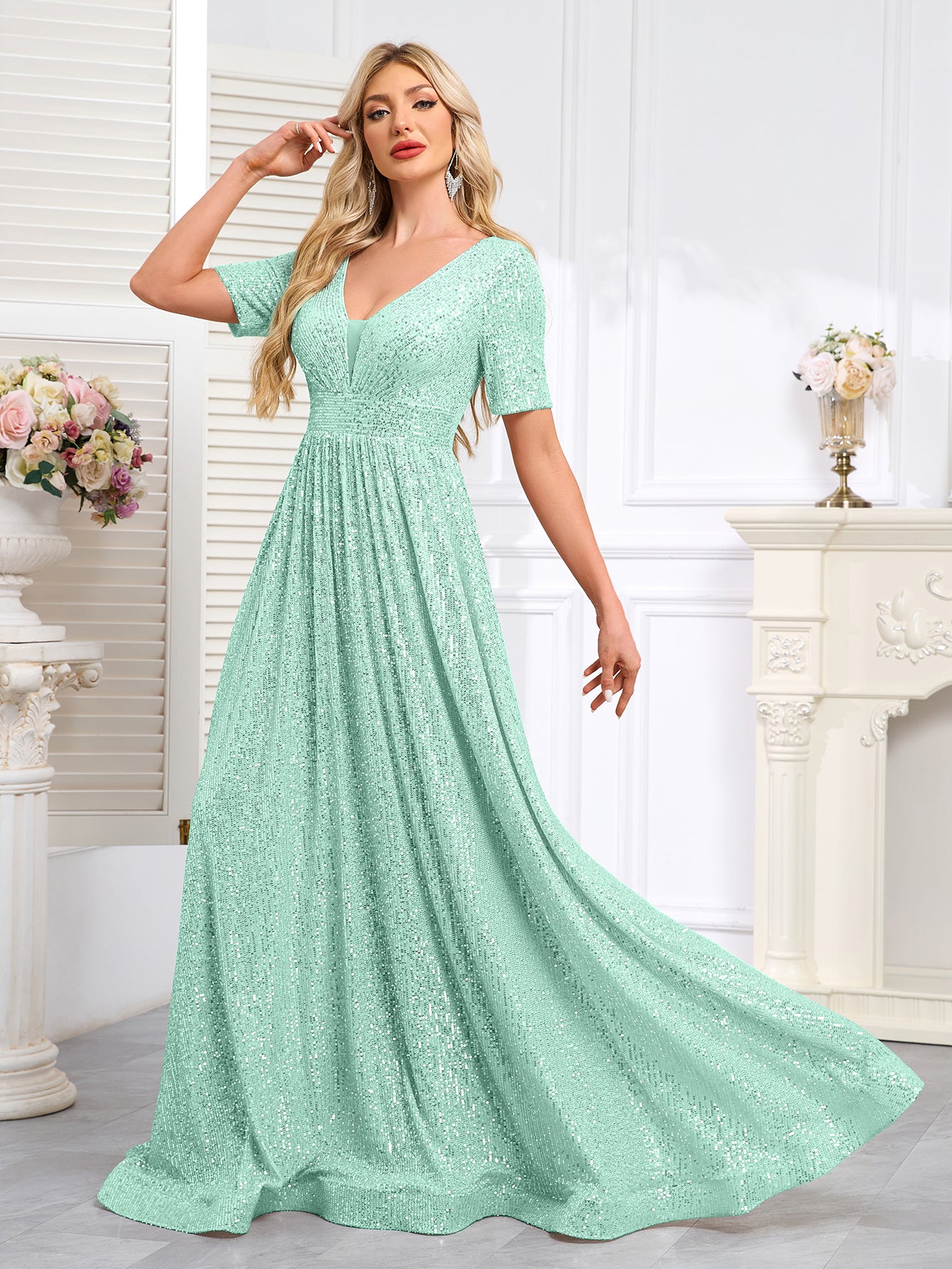 Royal Blue Sequined Short-Sleeve Gown With a Deep V-Neck and a Full, Flared Skirt.