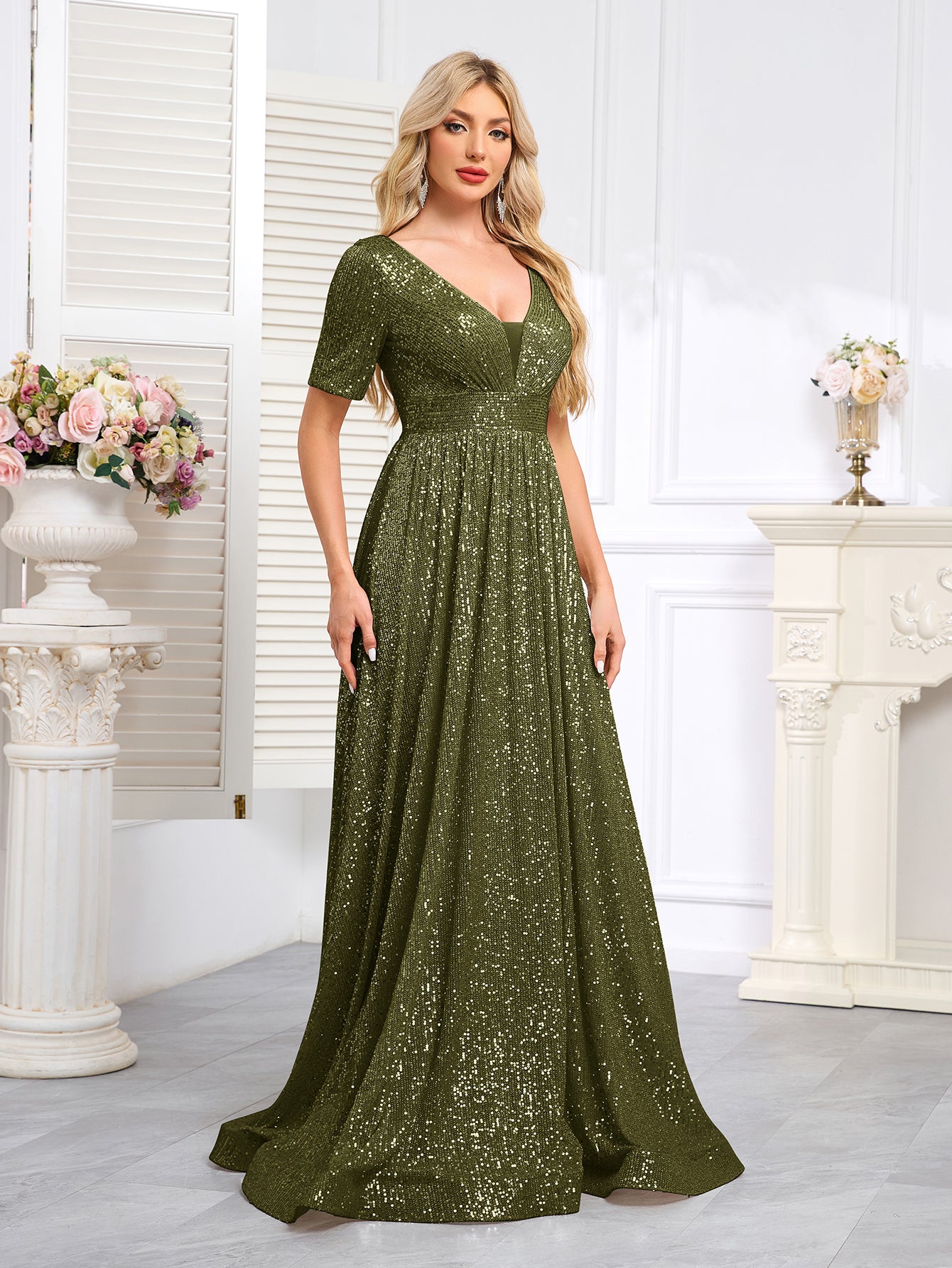 Royal Blue Sequined Short-Sleeve Gown With a Deep V-Neck and a Full, Flared Skirt.