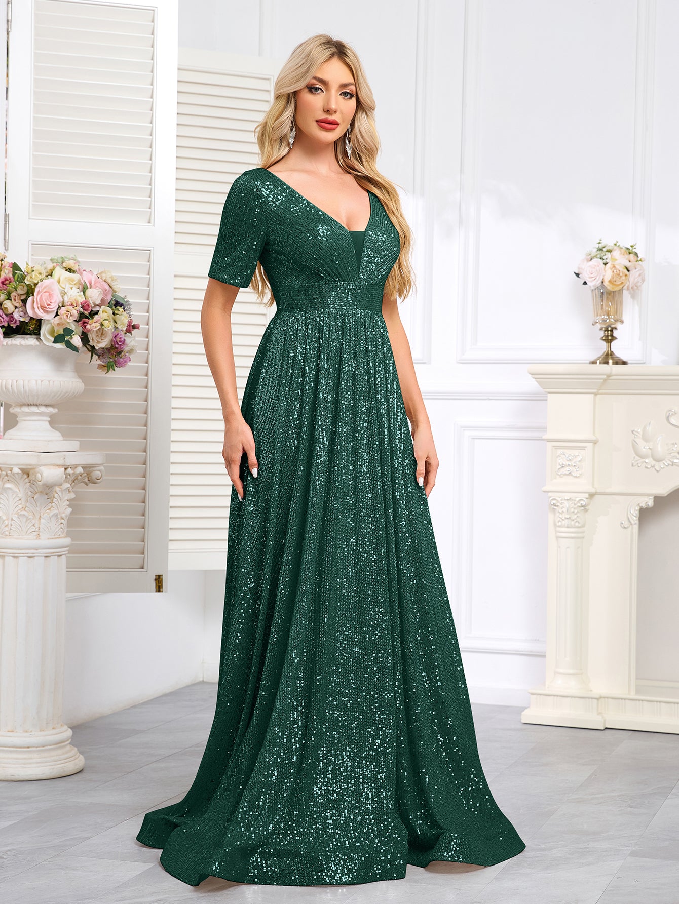 Royal Blue Sequined Short-Sleeve Gown With a Deep V-Neck and a Full, Flared Skirt.