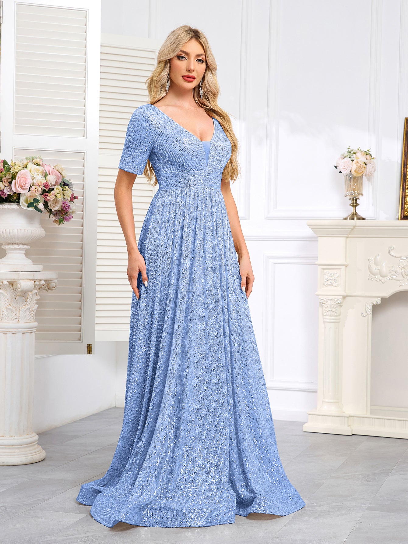 Royal Blue Sequined Short-Sleeve Gown With a Deep V-Neck and a Full, Flared Skirt.