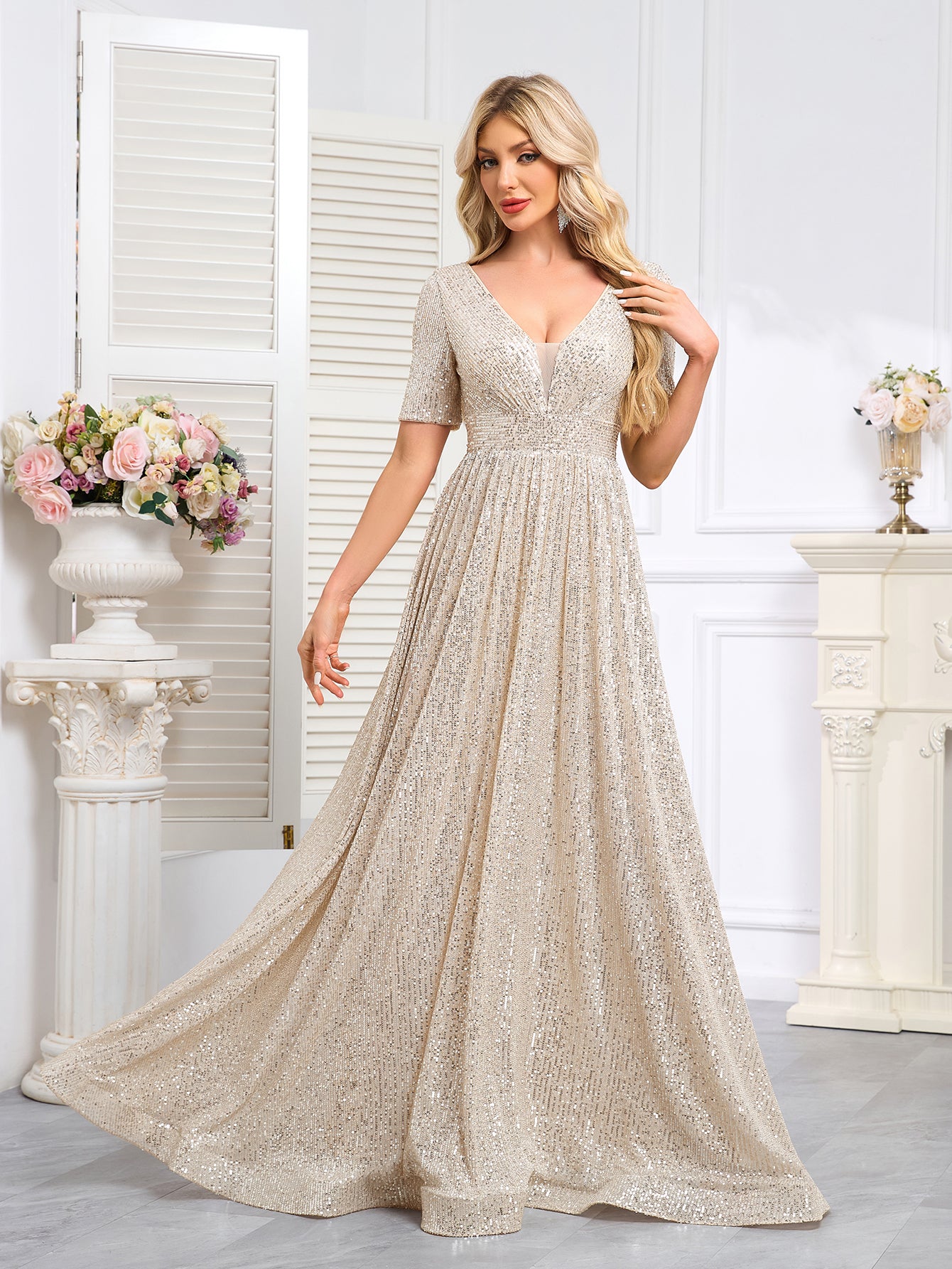 Royal Blue Sequined Short-Sleeve Gown With a Deep V-Neck and a Full, Flared Skirt.