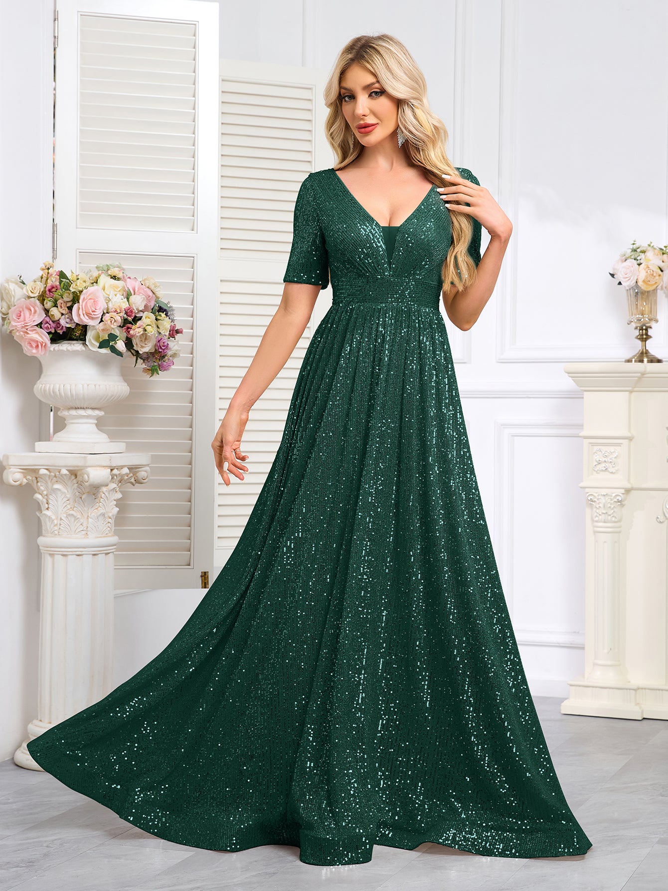 Royal Blue Sequined Short-Sleeve Gown With a Deep V-Neck and a Full, Flared Skirt.