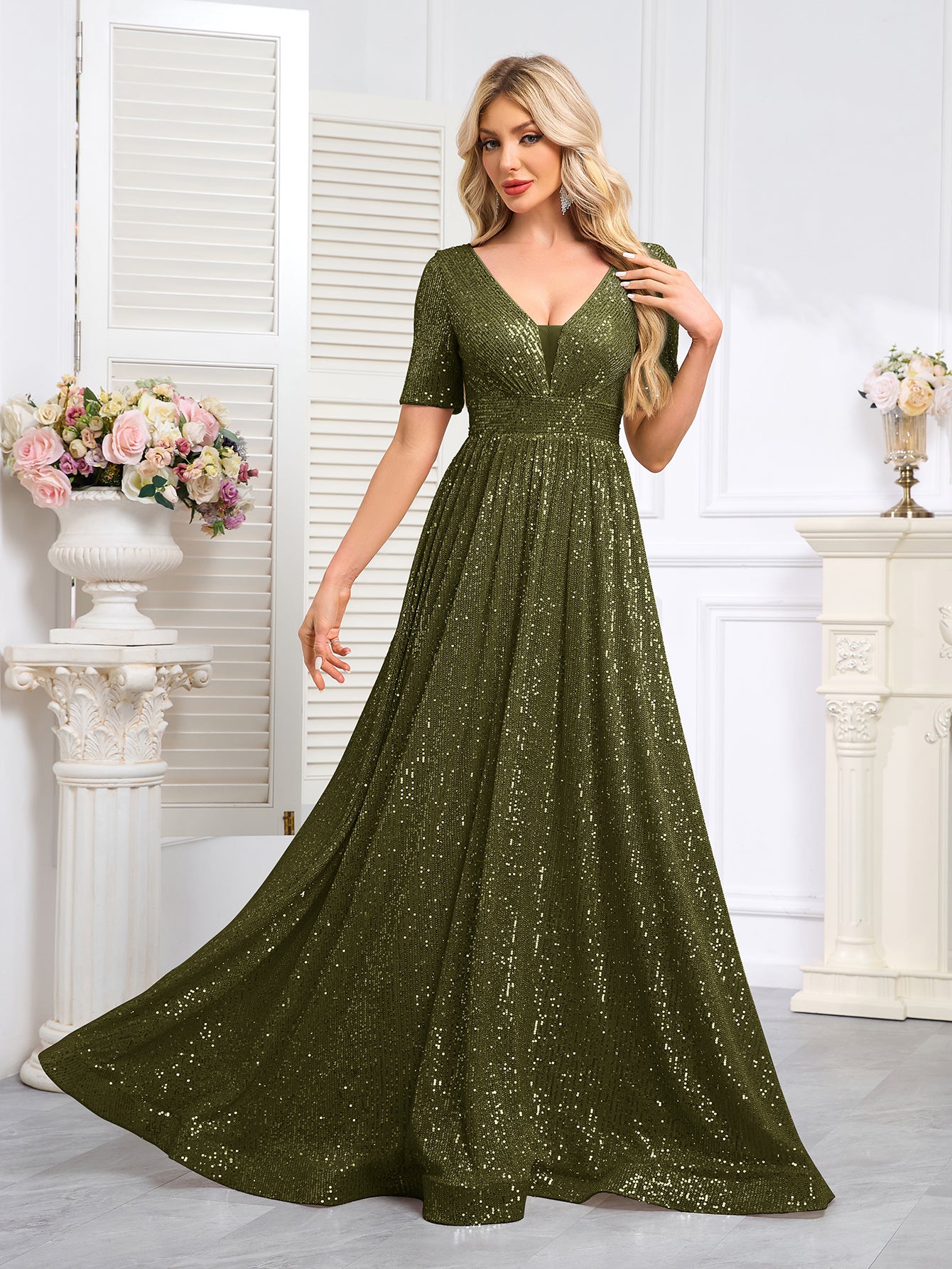 Royal Blue Sequined Short-Sleeve Gown With a Deep V-Neck and a Full, Flared Skirt.