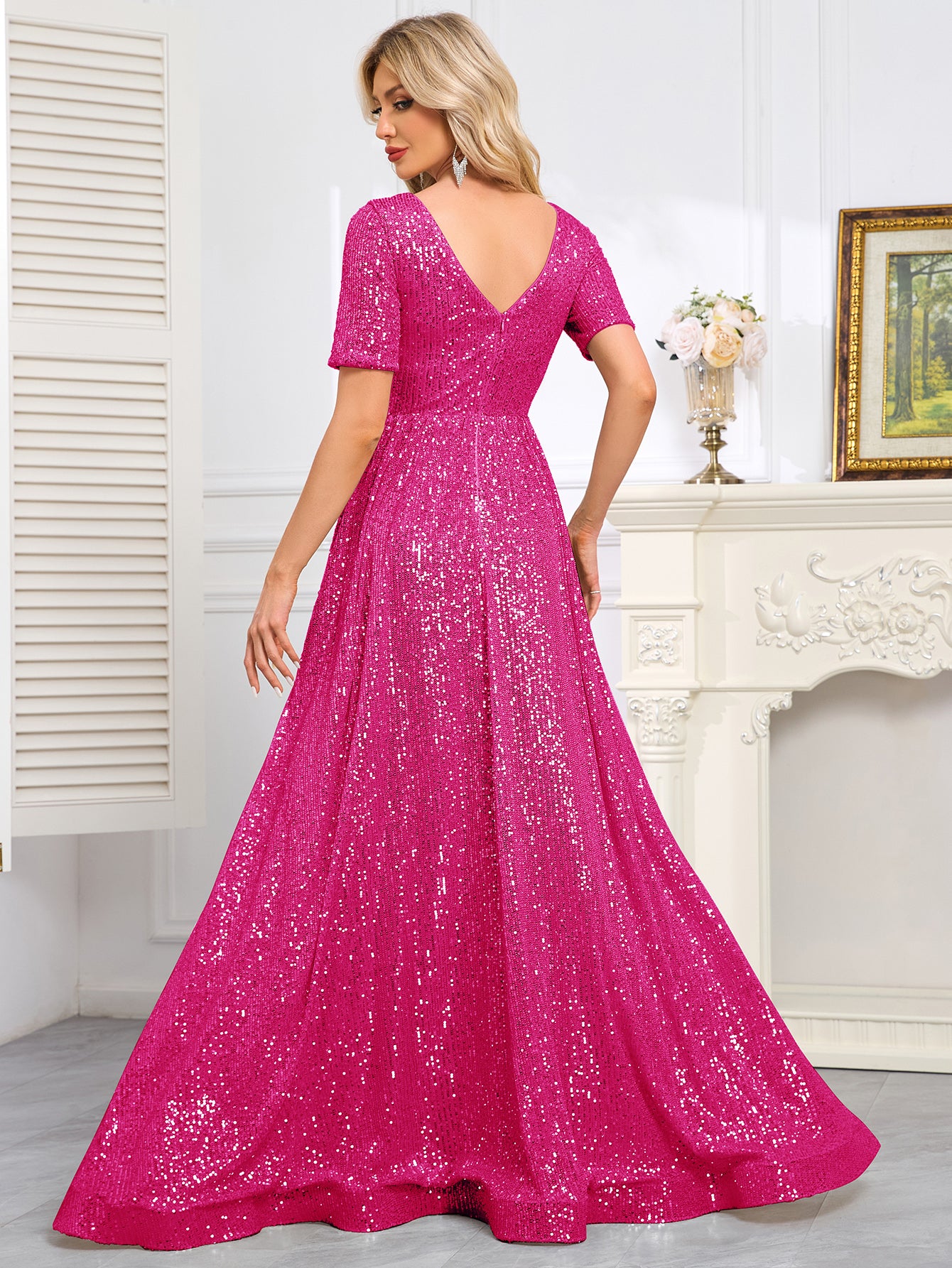 Royal Blue Sequined Short-Sleeve Gown With a Deep V-Neck and a Full, Flared Skirt.