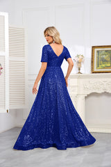 Royal Blue Sequined Short-Sleeve Gown With a Deep V-Neck and a Full, Flared Skirt.