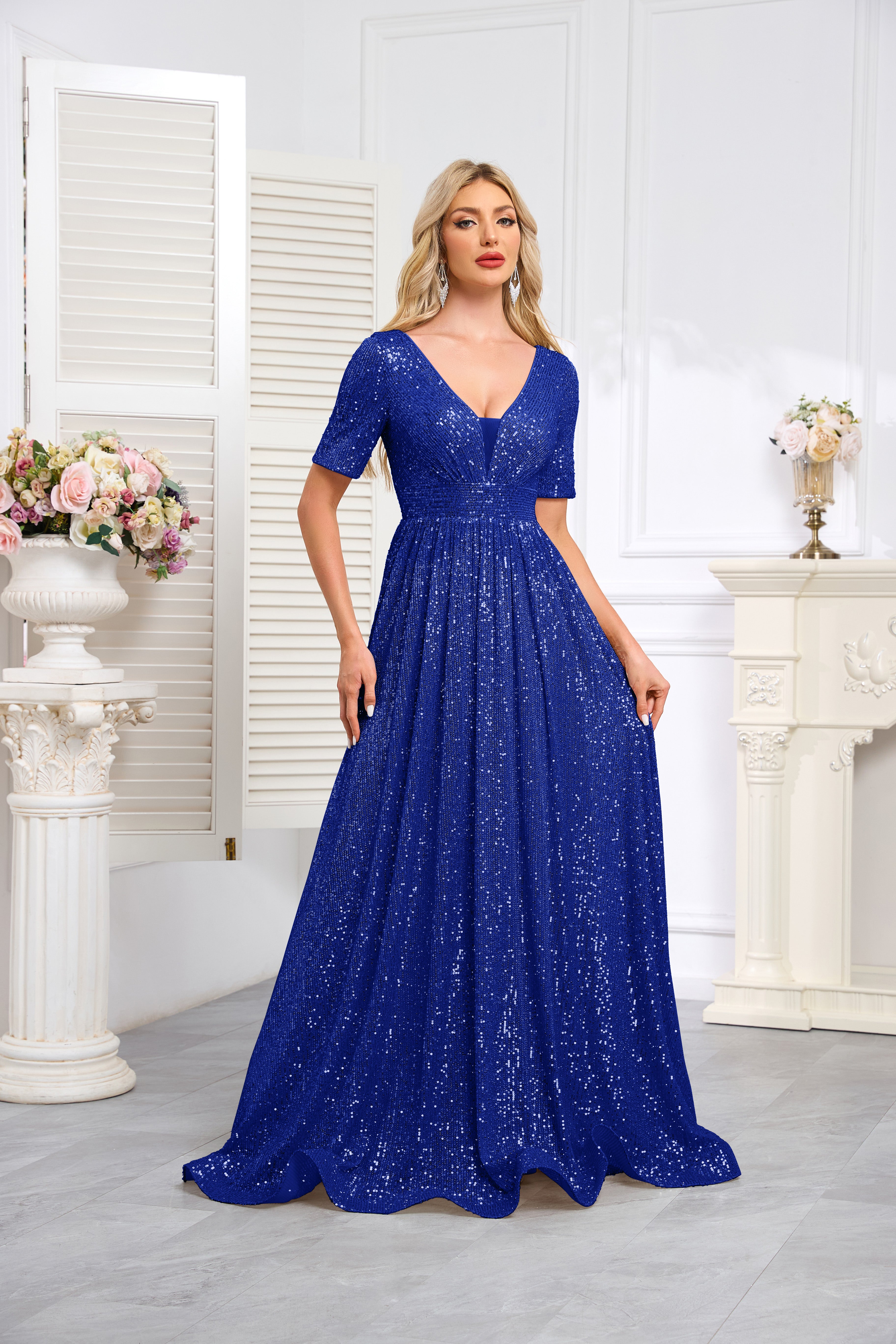 Royal Blue Sequined Short-Sleeve Gown With a Deep V-Neck and a Full, Flared Skirt.