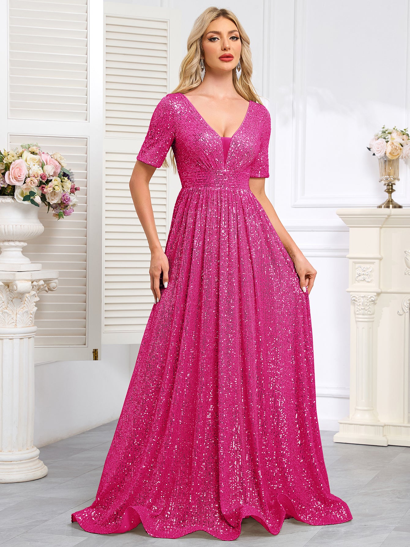 Royal Blue Sequined Short-Sleeve Gown With a Deep V-Neck and a Full, Flared Skirt.
