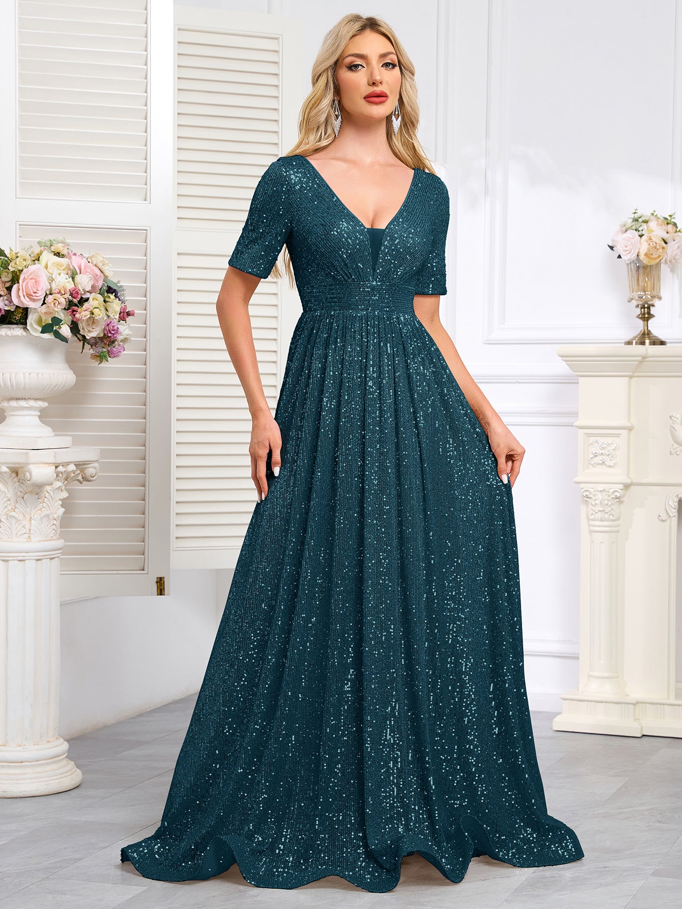 Royal Blue Sequined Short-Sleeve Gown With a Deep V-Neck and a Full, Flared Skirt.