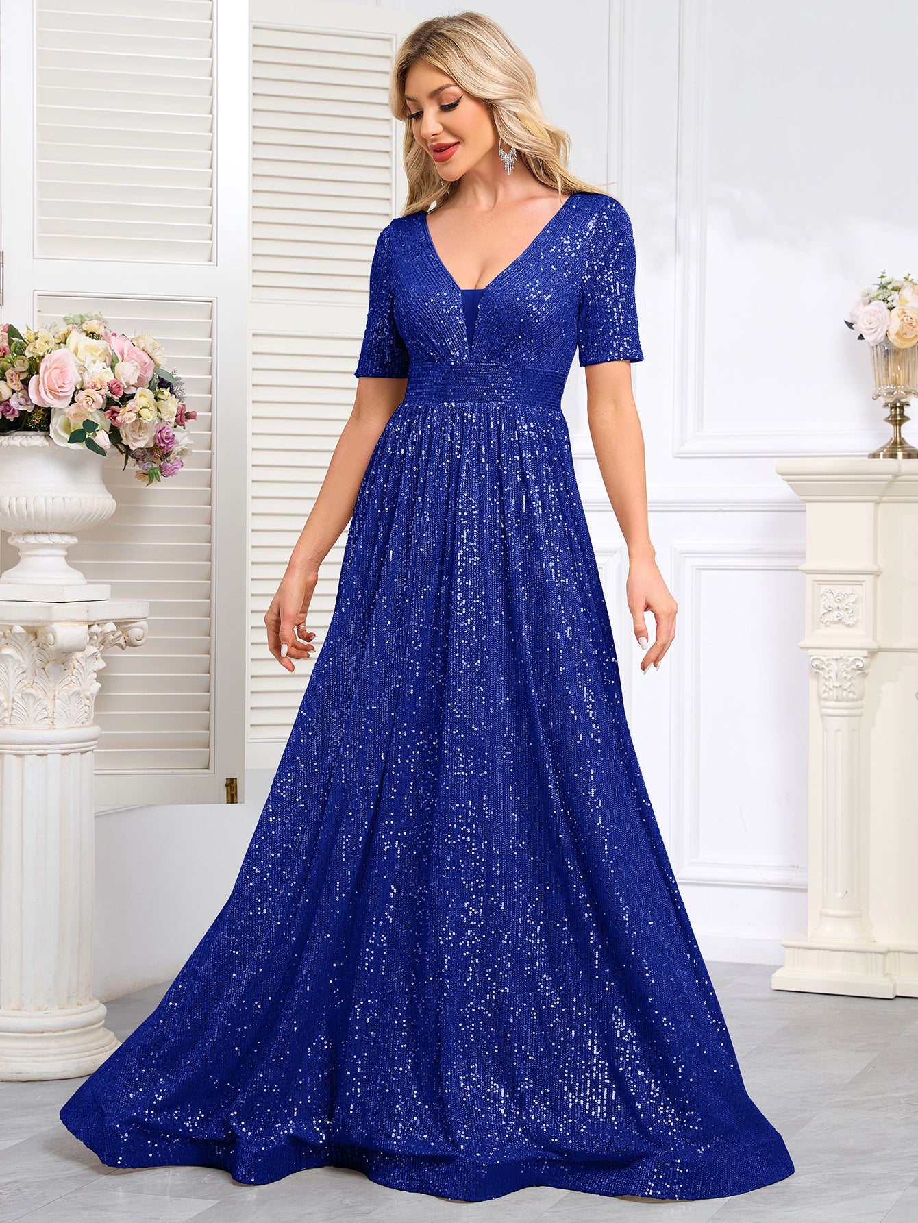 Royal Blue Sequined Short-Sleeve Gown With a Deep V-Neck and a Full, Flared Skirt.