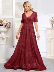 Royal Blue Sequined Short-Sleeve Gown With a Deep V-Neck and a Full, Flared Skirt.