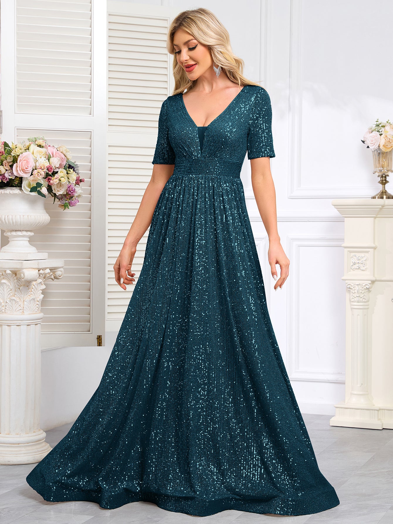 Royal Blue Sequined Short-Sleeve Gown With a Deep V-Neck and a Full, Flared Skirt.