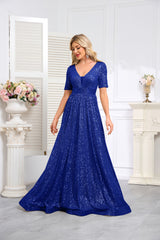 Royal Blue Sequined Short-Sleeve Gown With a Deep V-Neck and a Full, Flared Skirt.