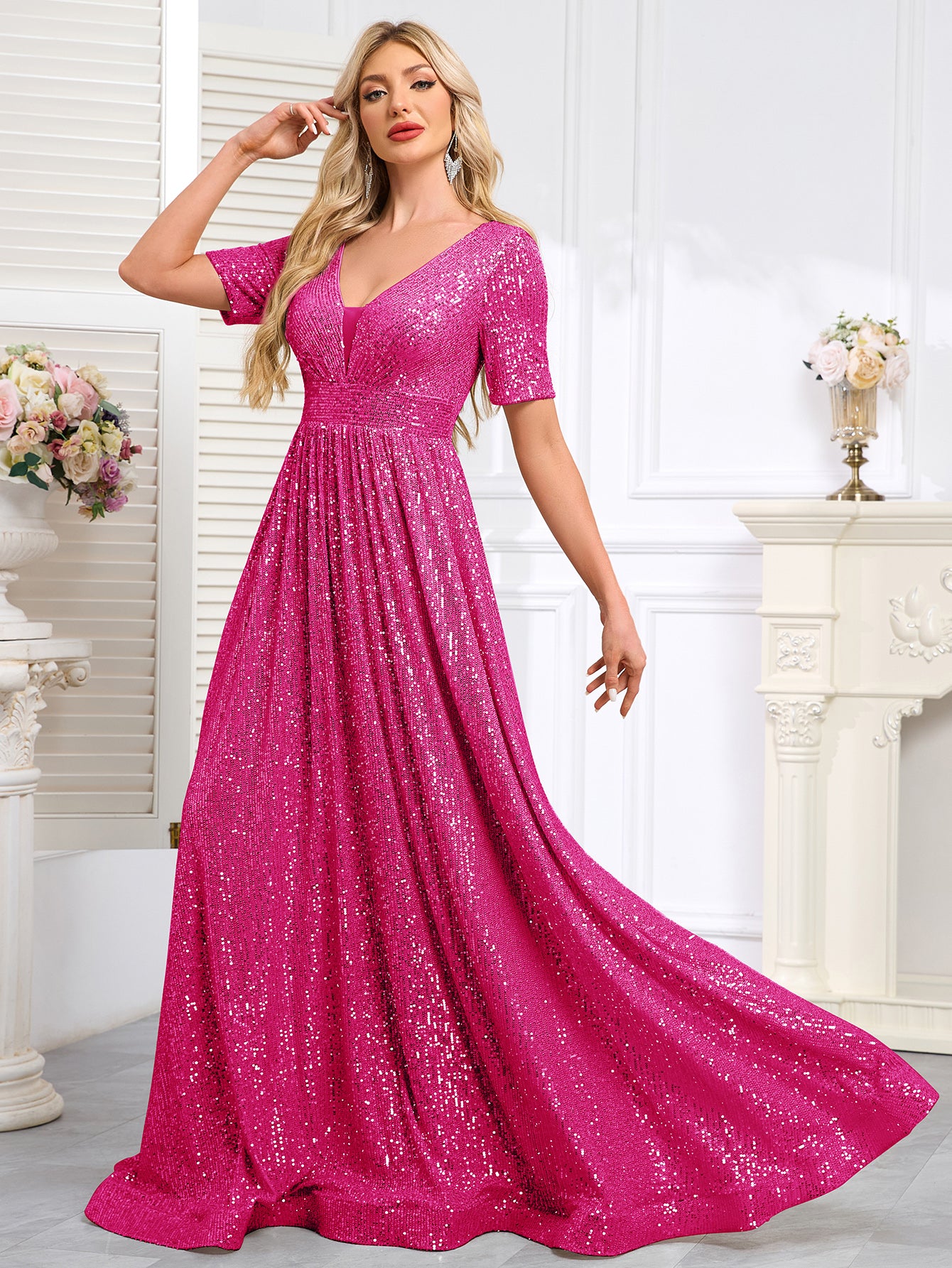 Royal Blue Sequined Short-Sleeve Gown With a Deep V-Neck and a Full, Flared Skirt.