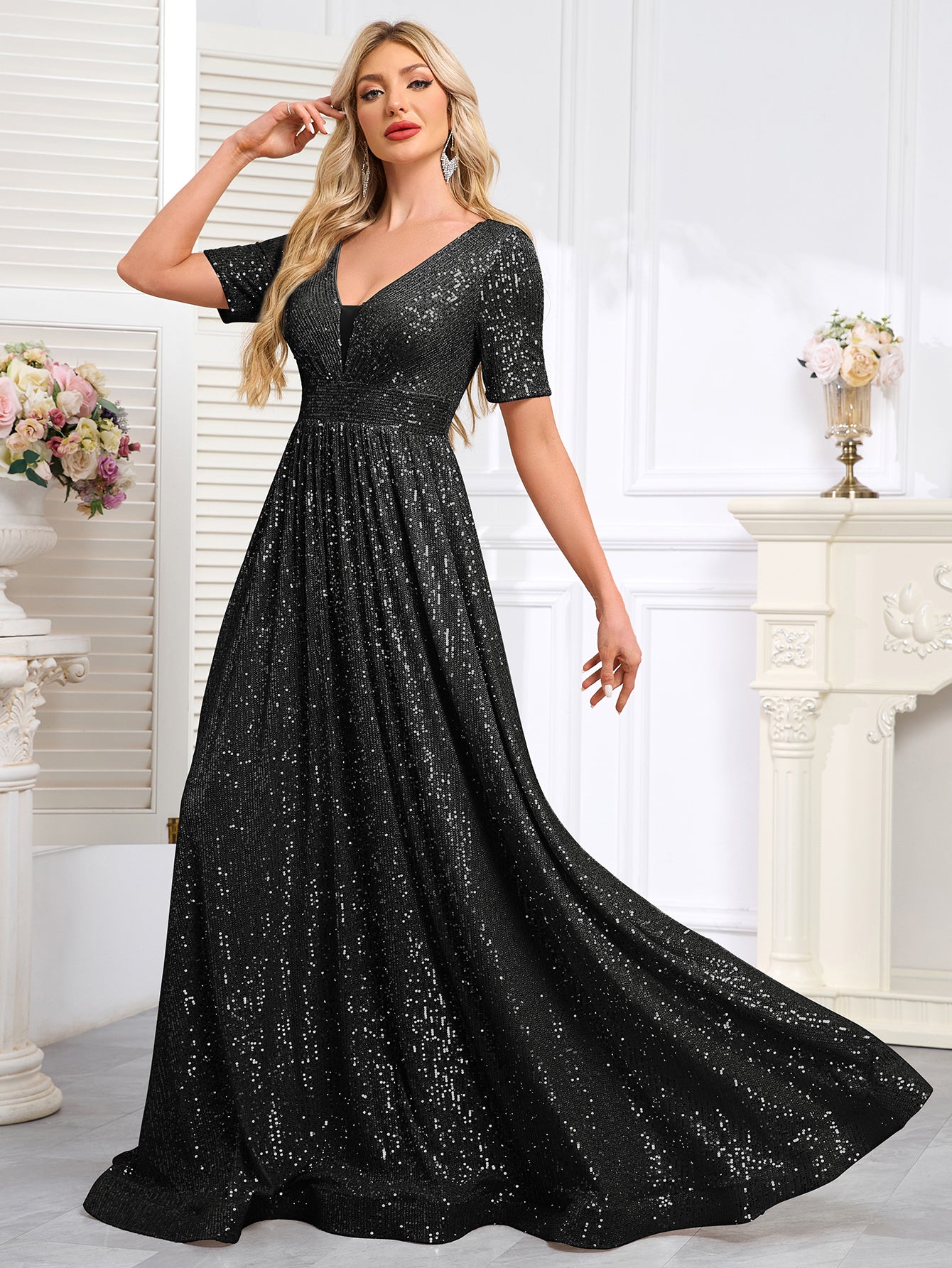 Royal Blue Sequined Short-Sleeve Gown With a Deep V-Neck and a Full, Flared Skirt.