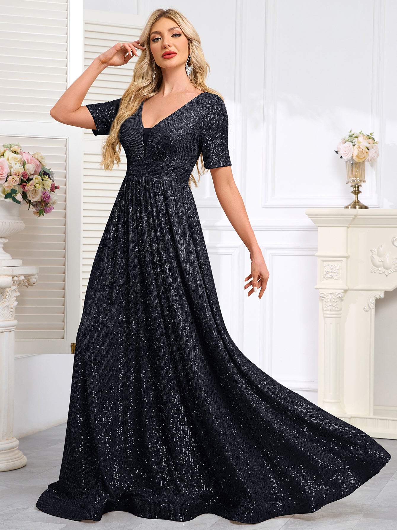 Royal Blue Sequined Short-Sleeve Gown With a Deep V-Neck and a Full, Flared Skirt.