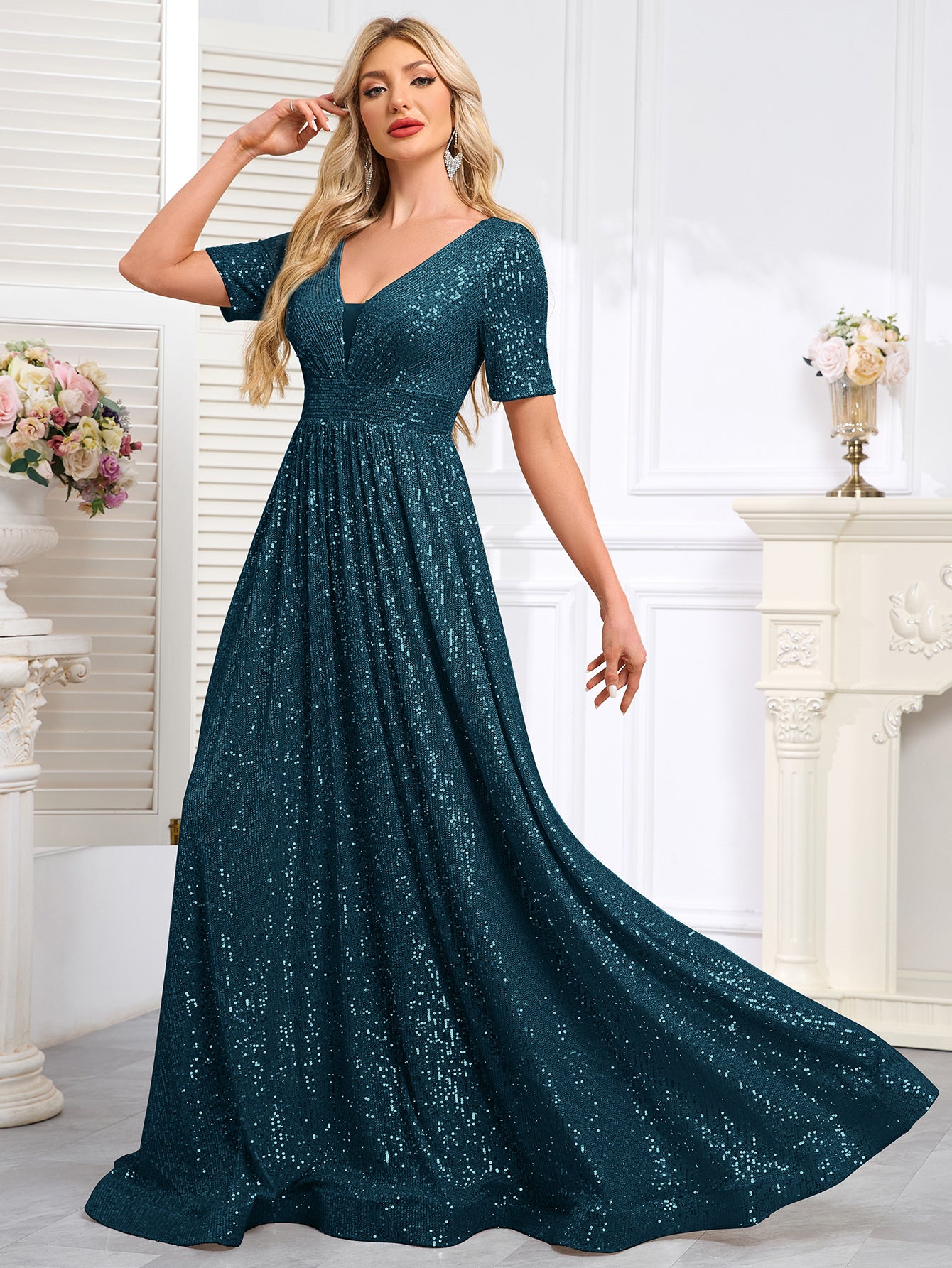 Royal Blue Sequined Short-Sleeve Gown With a Deep V-Neck and a Full, Flared Skirt.