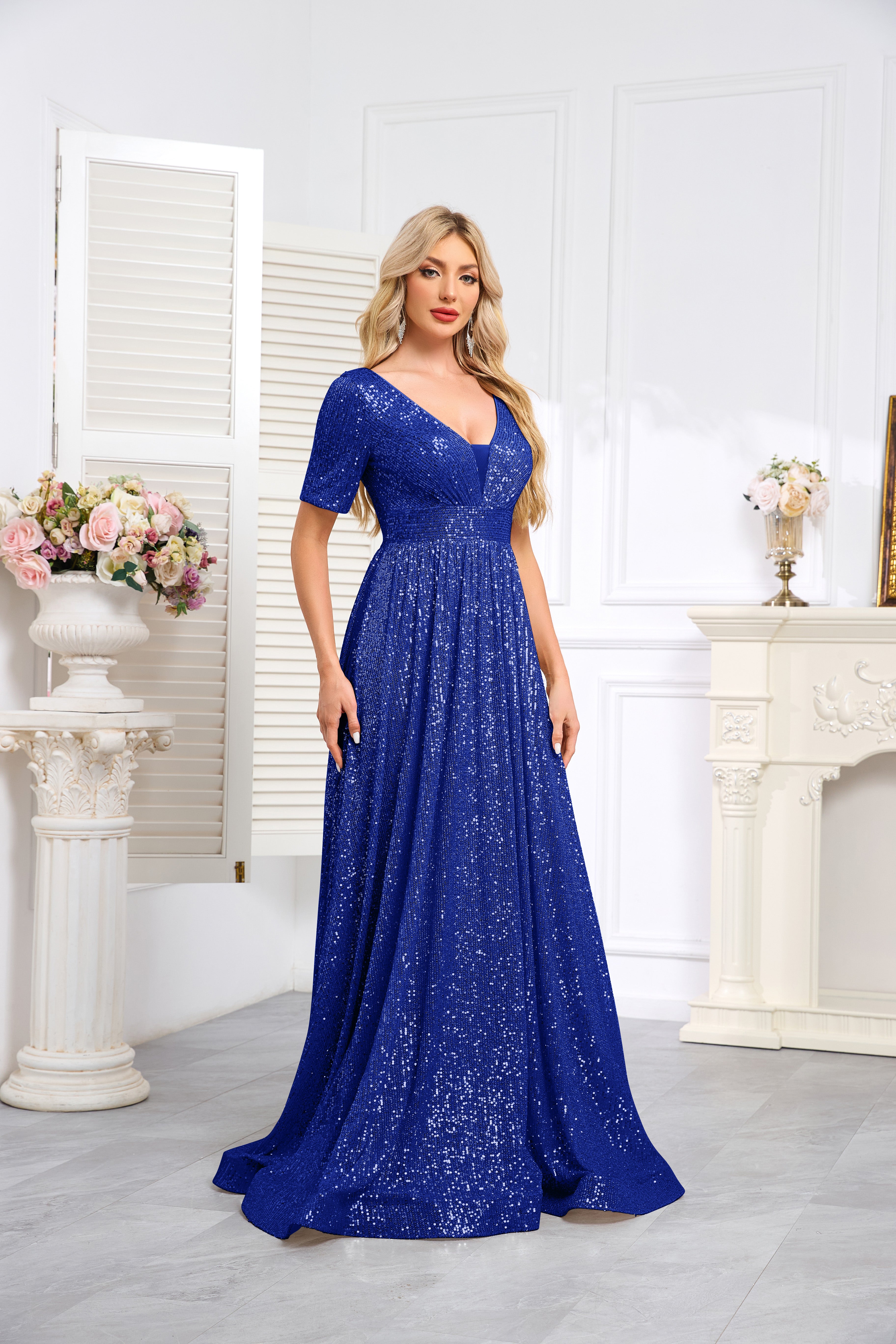 Royal Blue Sequined Short-Sleeve Gown With a Deep V-Neck and a Full, Flared Skirt.