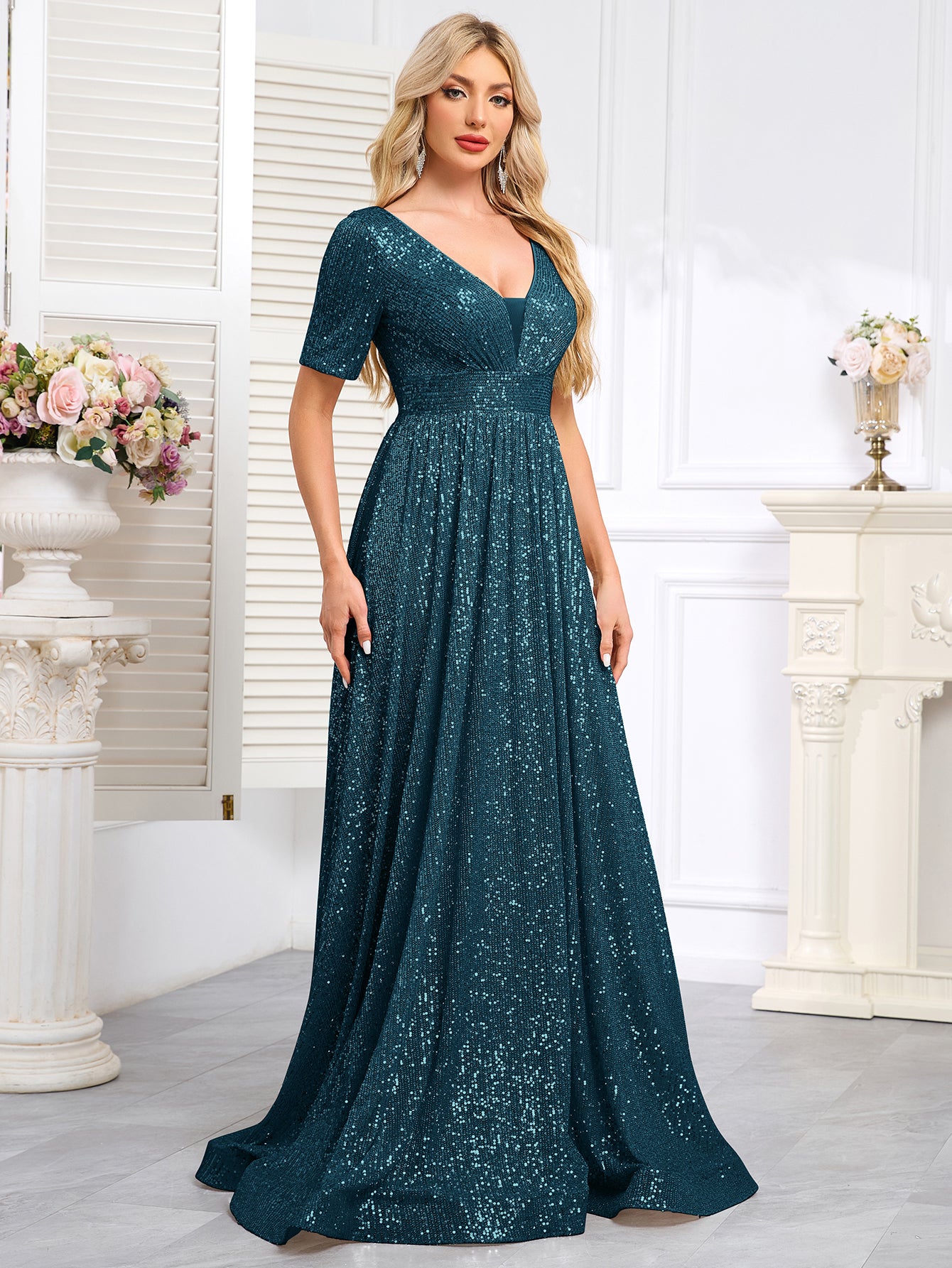 Royal Blue Sequined Short-Sleeve Gown With a Deep V-Neck and a Full, Flared Skirt.