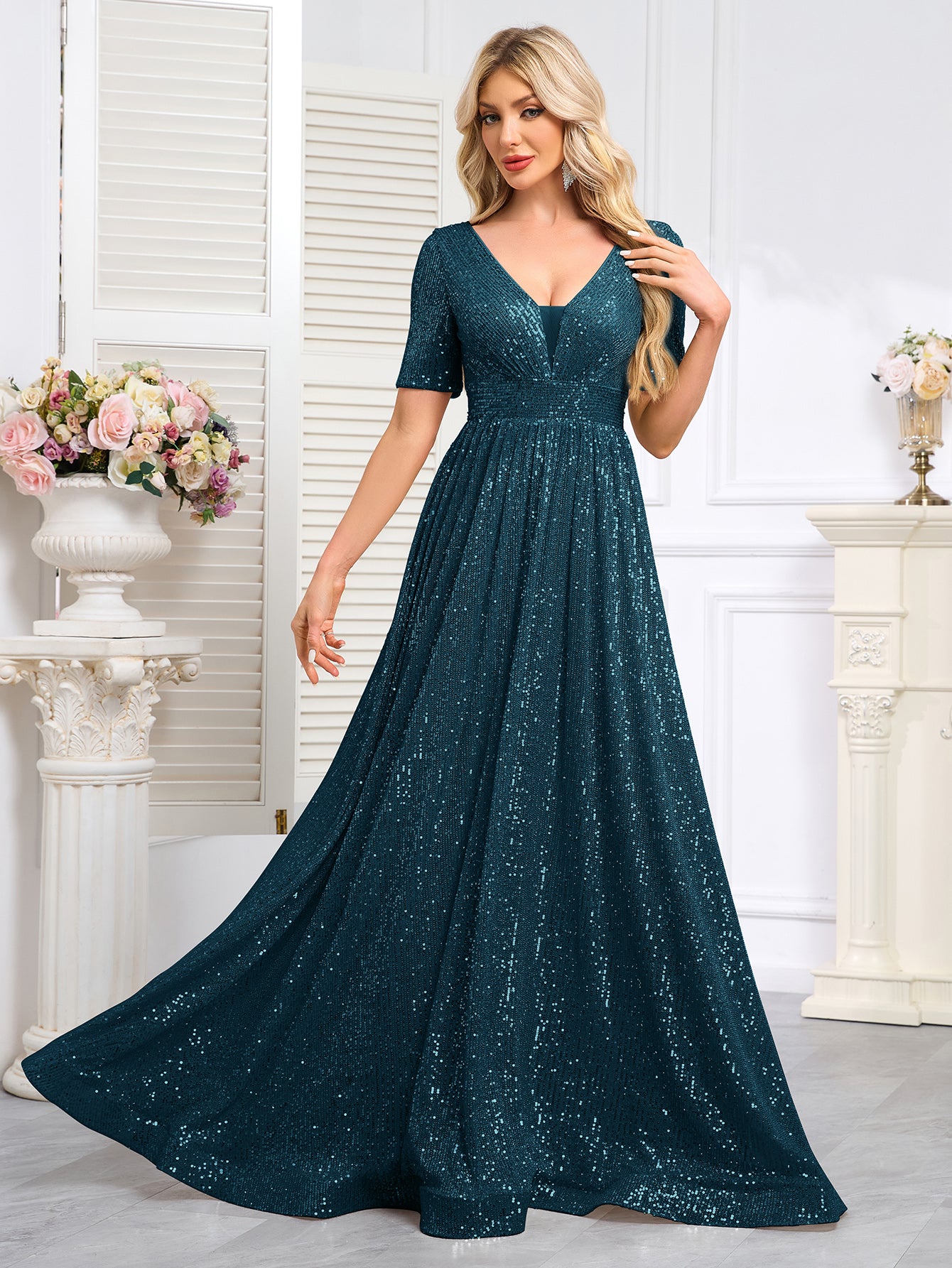 Royal Blue Sequined Short-Sleeve Gown With a Deep V-Neck and a Full, Flared Skirt.