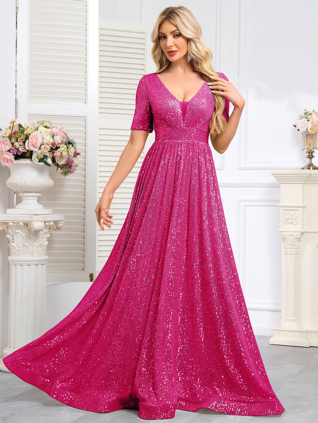 Royal Blue Sequined Short-Sleeve Gown With a Deep V-Neck and a Full, Flared Skirt.