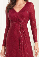 Long sleeve beaded dress with a girl